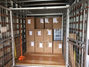 cardboard boxes in truck are packed with assistance from packing services Dallas