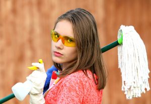 A woman with cleaning materials