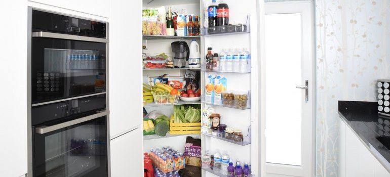 An open fridge full of food